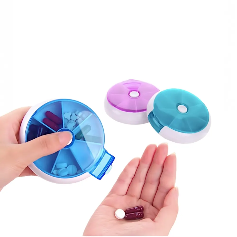 Pastillero ALBA de 7 compartimentos disponible en verde, azul y morado